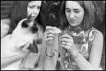Photograph: [Girls Hold and Feed Pets]