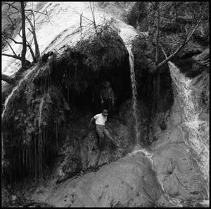Primary view of object titled '[M.U. Students Climb Out of Cave]'.