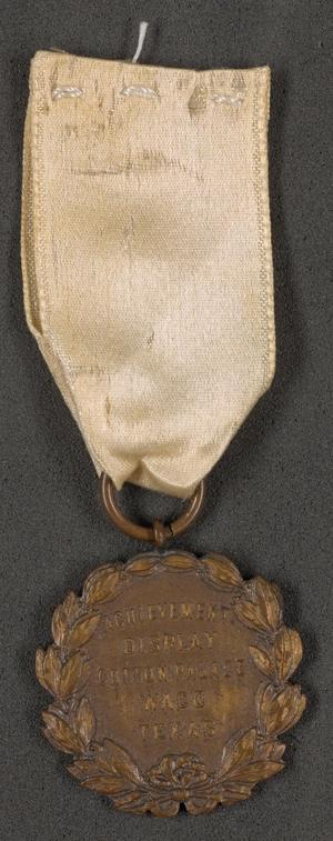 Primary view of object titled '[Achievement Badge From the 1929 Texas Cotton Palace]'.