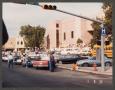 Photograph: [Crowd and Cars outside Nolan County Courthouse]
