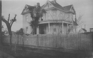 Primary view of object titled '[Postcard image of a two and a half story Richmond home]'.