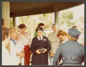 Primary view of object titled '[Group of Women Airforce Service Pilot veterans at reunion under pavilion]'.
