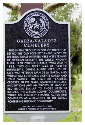Primary view of object titled '[Plaque at Garza-Valadez Cemetery]'.