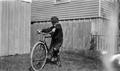 Thumbnail image of item number 1 in: '[Child Standing With Bicycle]'.