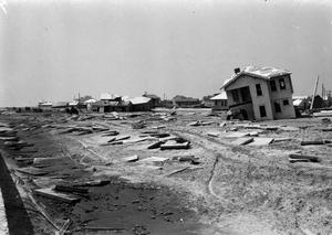 Primary view of object titled '[Damaged Homes and Debris]'.