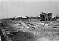 Thumbnail image of item number 1 in: '[Damaged Homes and Debris]'.