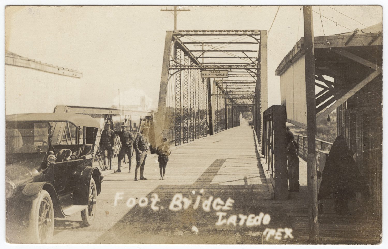 [International Bridge between Laredo, Texas and Mexico]
                                                
                                                    [Sequence #]: 1 of 2
                                                