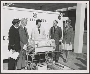 Primary view of [Photograph of Five People With an Incubator]