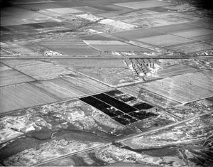 Primary view of object titled '[Aerial Photograph of Feed Yards in Winter]'.