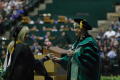 Primary view of [Student at Masters Commencement Ceremony]