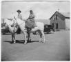 Thumbnail image of item number 1 in: 'Mr. and Mrs. E.L. Jones on horseback'.