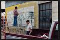 Photograph: [Photograph of Painters Restoring Dr. Pepper Mural]