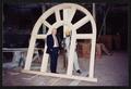 Photograph: [Wilton Lanning and Joe Cavanaugh Standing in an Arched Window Frame]