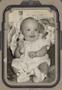 Photograph: [Portrait of an Infant with Rattle]