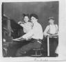 Photograph: Children around a Piano