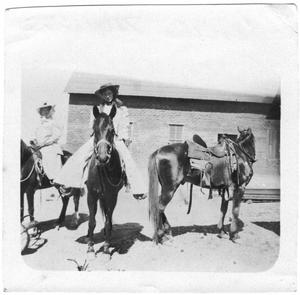 Primary view of object titled '[Helen Moore and Essie Monday riding horses in Taviche, Mexico]'.