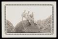 Photograph: [Army Soldiers on Boulder]