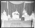 Photograph: [Group Seated on Stage with Kendall County Fair Queen]