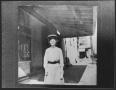 Photograph: Unidentified Woman at Storefront