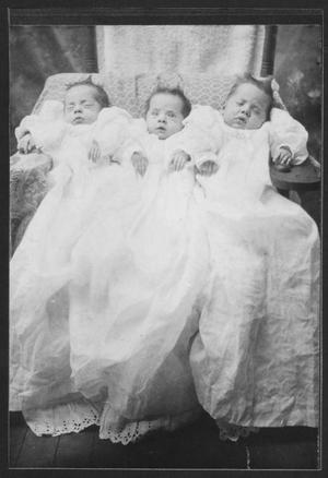 Primary view of object titled 'Infant Triplets in a Chair'.