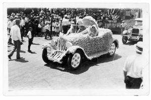 Primary view of object titled 'Covered Car in Parade'.