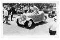 Photograph: Covered Car in Parade