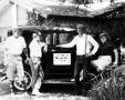 Photograph: [Group with Model A Ford]