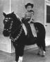 Photograph: [William M. Howland on a Pony]