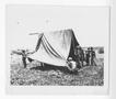 Photograph: [Servicemen Setting Up Tent]