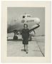 Photograph: [Jane Kendeigh in Front of Air Transport Service Airplane]