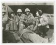Photograph: [Jane Kendeigh with Soldier on Stretcher]