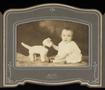 Photograph: [Portrait of an Unknown Child and a Stuffed Cat]