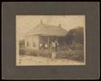 Photograph: [Portrait of an Unknown Family on a Porch]