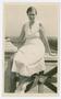 Primary view of [Catherine Freeman Nimitz Sits on Railing]