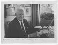 Photograph: [Chester W. Nimitz Sits at Desk]