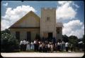 Photograph: [Photograph of People in Front of Building]