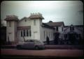 Photograph: [Photograph of White Building]
