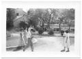 Primary view of [Six Teenagers Standing in a Courtyard]
