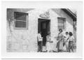 Primary view of [Teacher and Students Outside of School House]