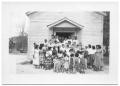 Photograph: [Large Group of Hispanic People at the Entrance of a Building # 2]