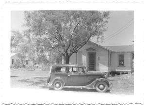 Primary view of object titled '[Car Parked in Front of a House]'.