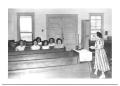 Thumbnail image of item number 1 in: '[Group of Girls Sitting Together in Church Pews]'.