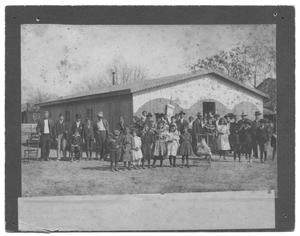 Primary view of object titled '[Large Congregation in Front of a Wood-Slatted Church]'.