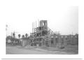 Thumbnail image of item number 1 in: '[Side View of a Building Under Construction]'.