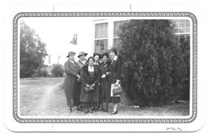 Primary view of object titled '[Six Hispanic Ladies Standing in Front of a Building]'.