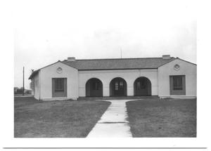 Primary view of object titled '[Front Entrance to a Building with Arches]'.