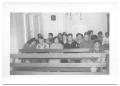 Thumbnail image of item number 1 in: '[Congregation of Hispanic People Sitting in the Pews of a Church]'.
