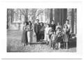 Photograph: [Group of Hispanic People in Front of a Building]