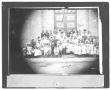 Photograph: [Group of Hispanic Children in Front of a Decorative Door]