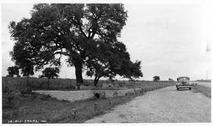 Primary view of object titled '[Photograph of Sitting Area Next to Road]'.